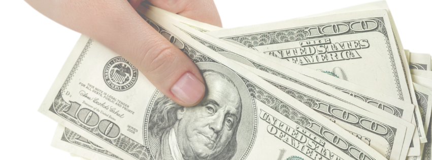 Hand holding many $100 dollar bills, fanned out