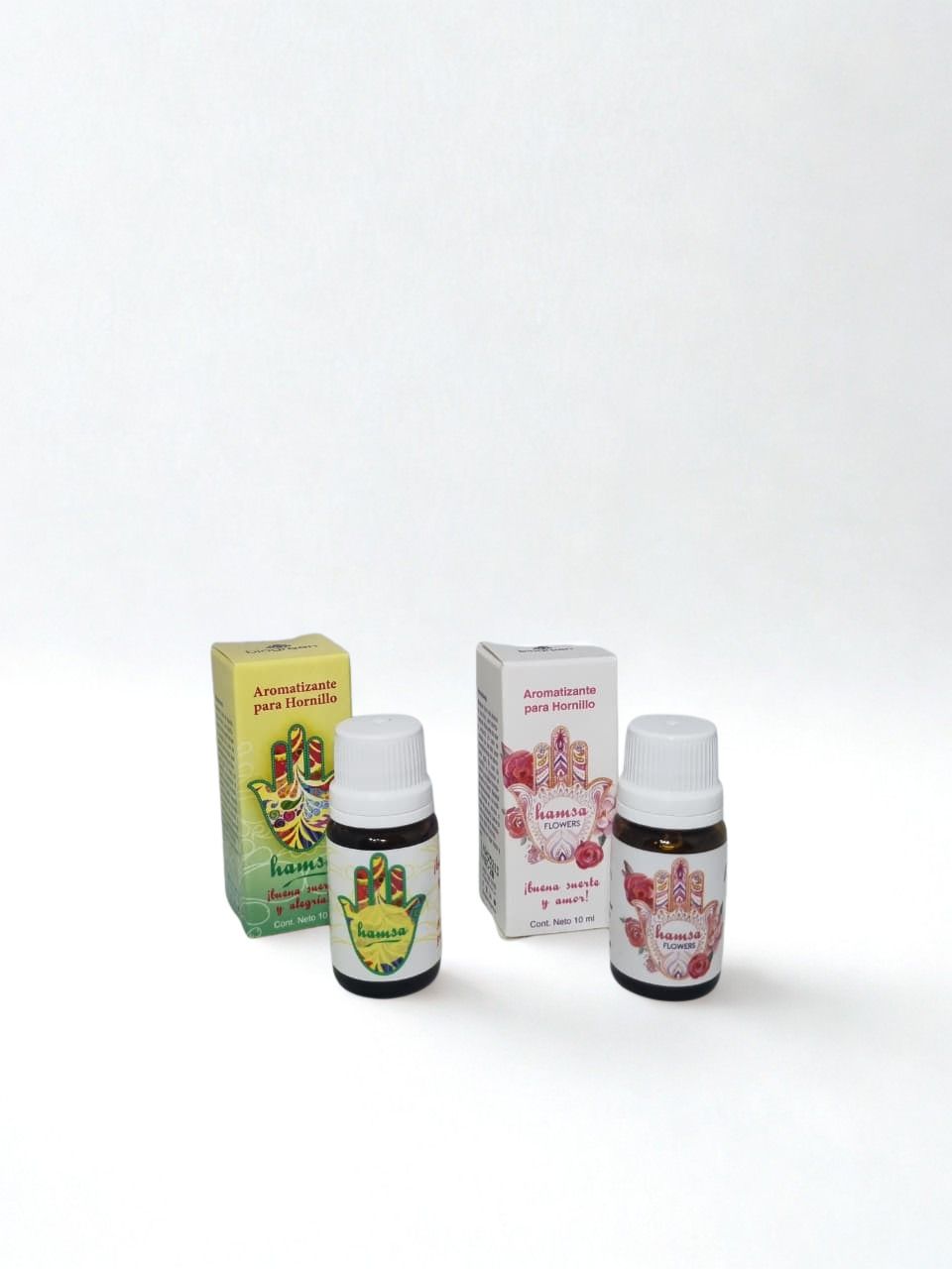 Dos pequeños frascos de suplementos con sus cajas a juego