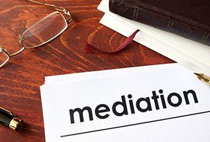 Mediation — Papers with Title Mediation on a Table in Victoria, TX