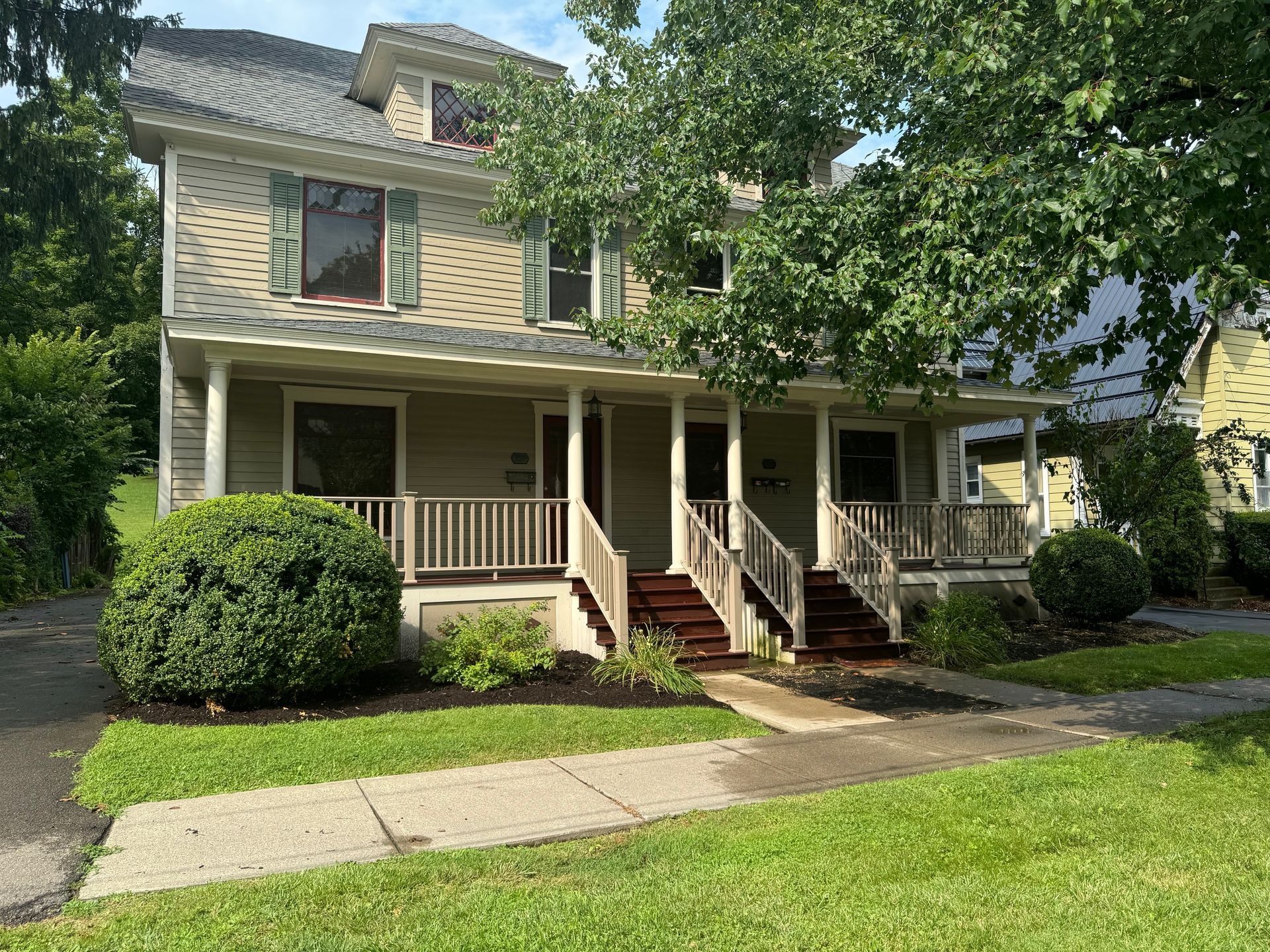 8 Court Street – Two-story tan building with a Domino’s storefront on the ground level, located on Court Street.