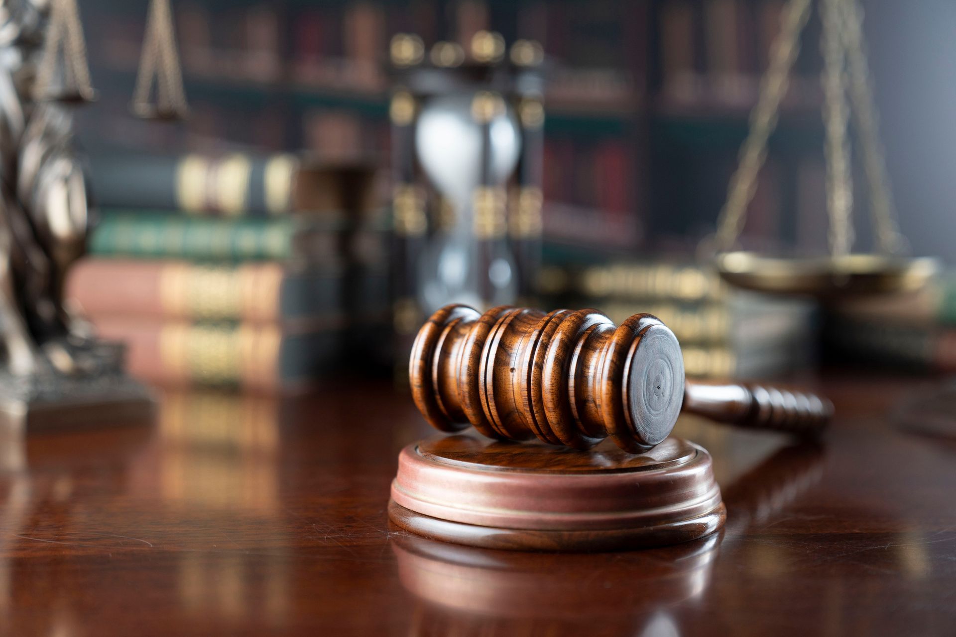 Law symbols on library background.