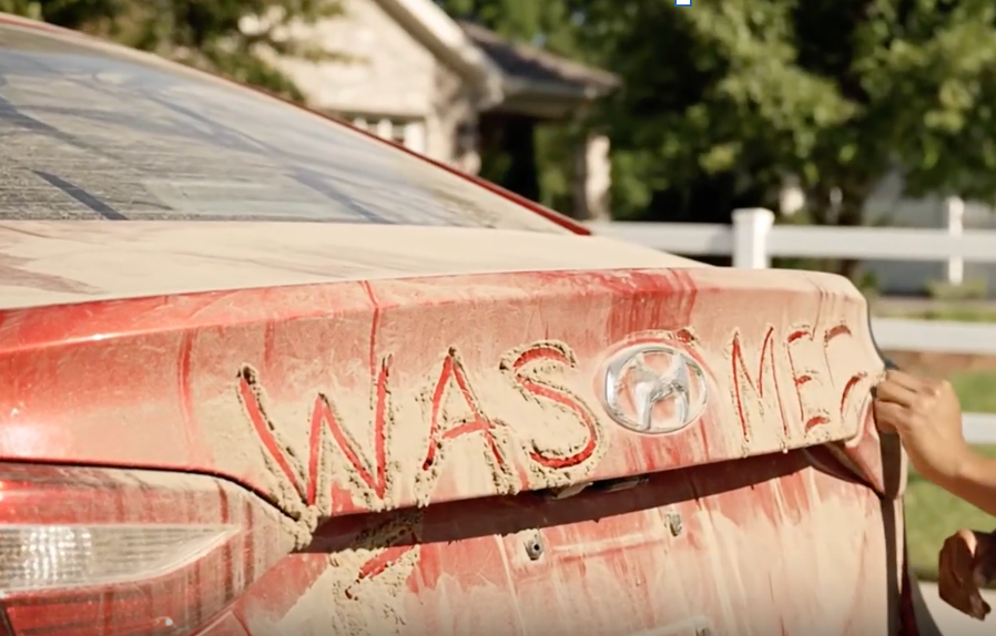 wash me dirty red car