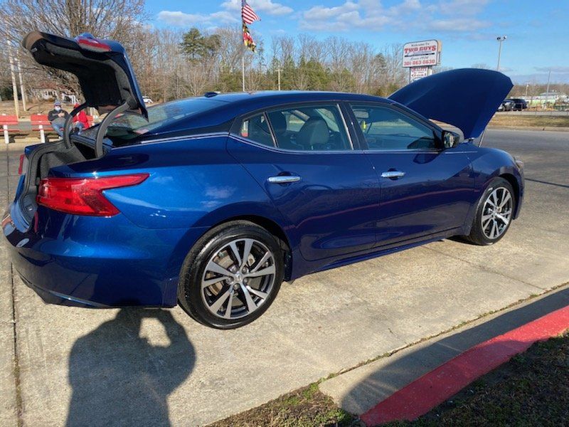 blue car shined after detailing
