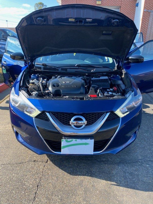 blue car detailed at cheseldine car wash
