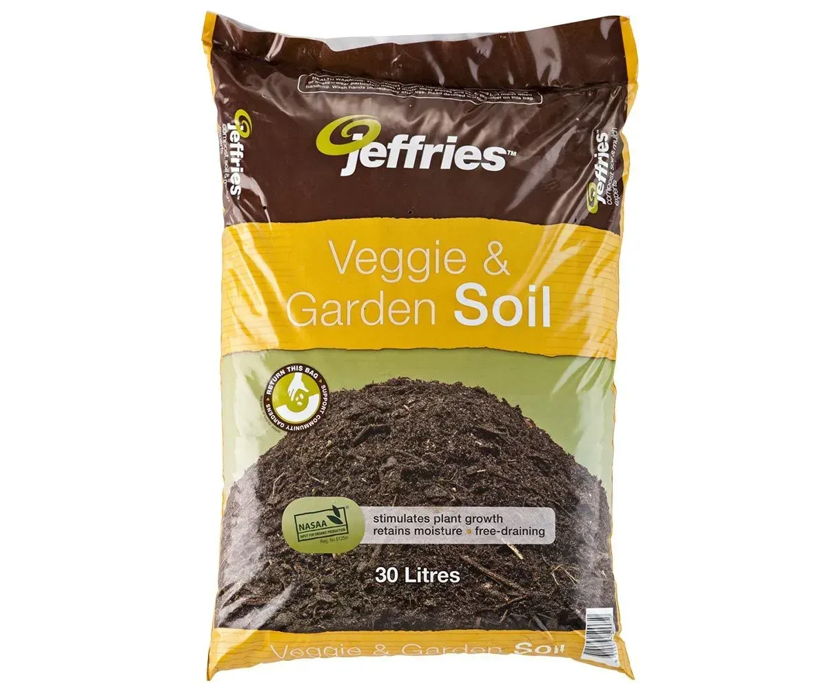 Bag of Jeffries Veggie & Garden Soil; brown, yellow, and green packaging; 30 liters.