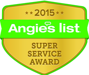 A gold shield emblem with green text reading