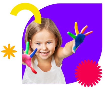 A little girl with her hands painted in different colors.