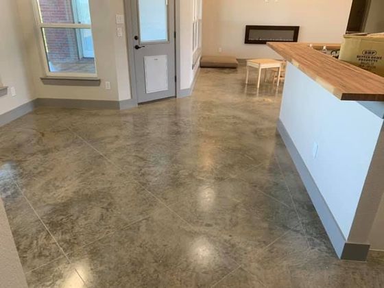 A man is loading boxes into the back of a van.