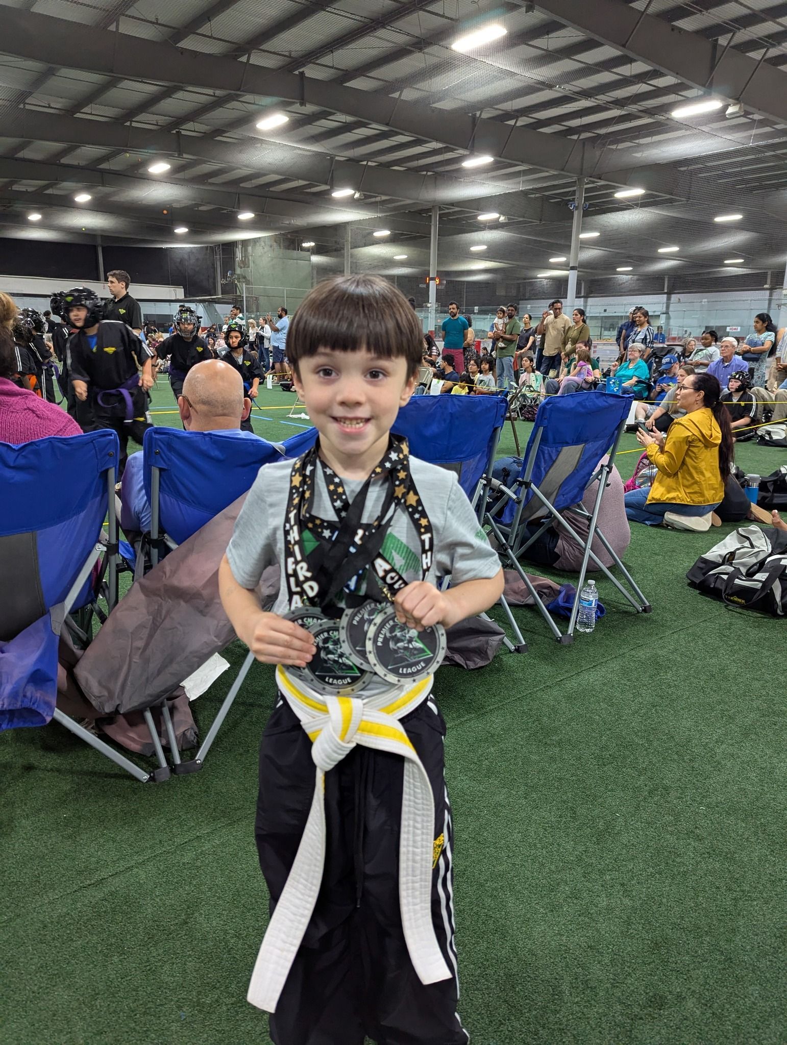 An aerial view of a city skyline at sunset.