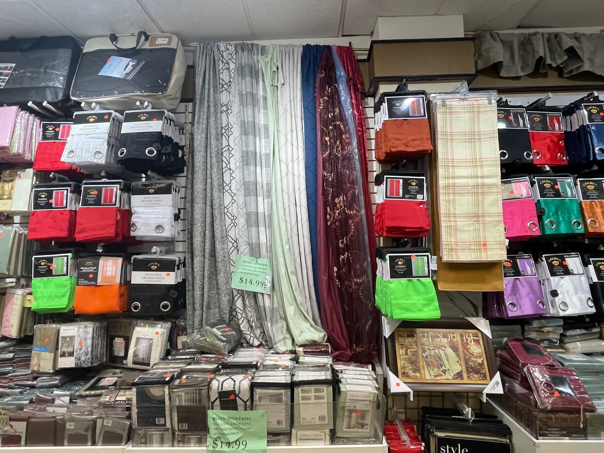 A store filled with lots of clothes and curtains