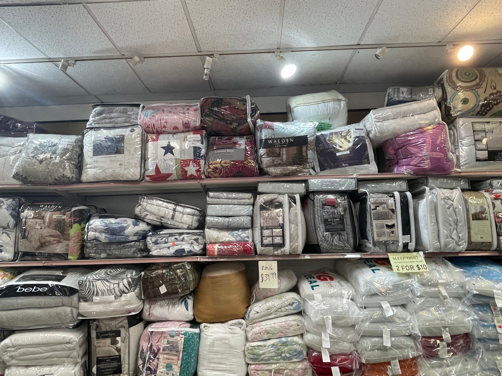 A store filled with lots of blankets and pillows.
