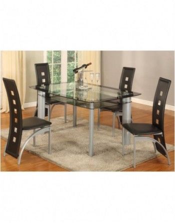 A glass dining table with black chairs in a living room.