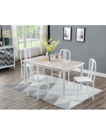 A white dining table and chairs set in a living room.