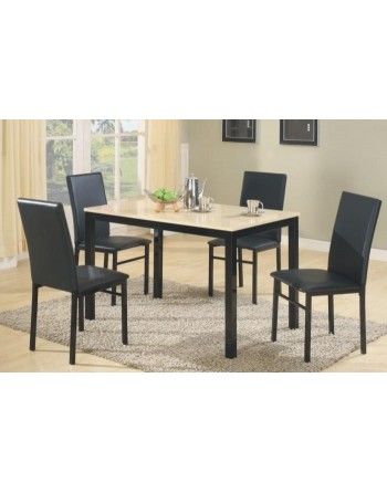 A dining room table and chairs set in a living room.