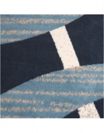 A close up of a blue and white striped rug