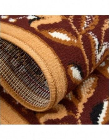 A close up of a rug with a floral pattern on it.