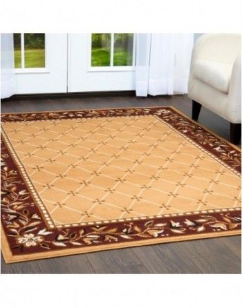 A living room with a rug and a chair