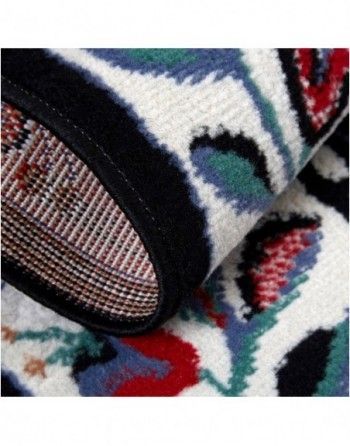 A close up of a rug with a colorful pattern