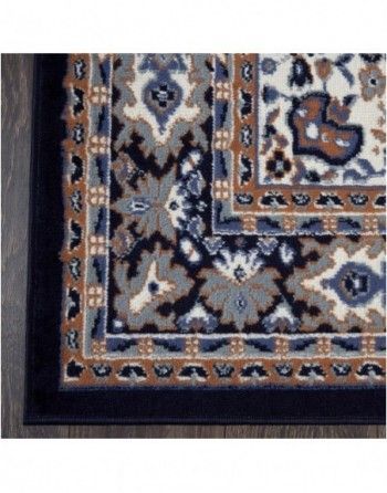 A close up of a rug with a black border