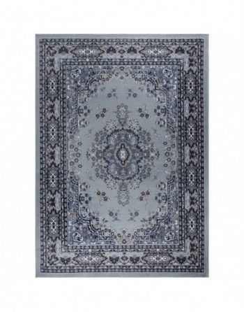 A gray rug with a floral pattern on it is on a white background.