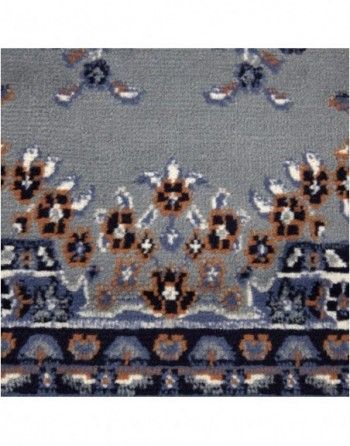 A close up of a rug with a floral pattern on it