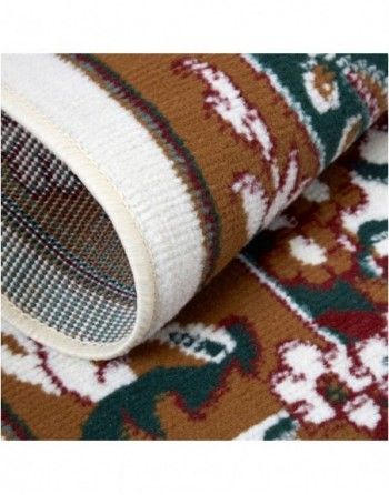 A close up of a rug with a floral pattern on it.