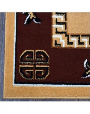 A brown and tan rug with a greek key pattern