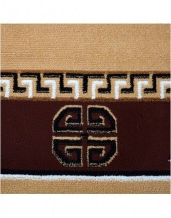 A close up of a rug with a greek key pattern