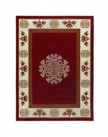 A red rug with a circular design on it