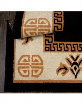 A rug with a greek key pattern on it