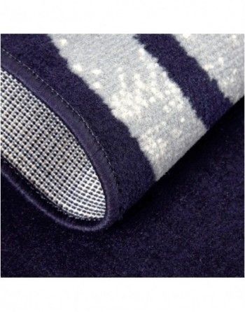 A close up of a blue and white striped rug