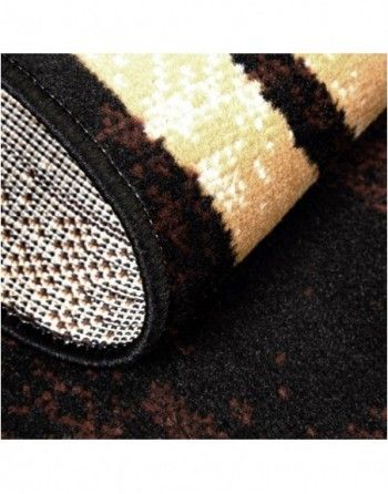 A close up of a rug with a striped pattern