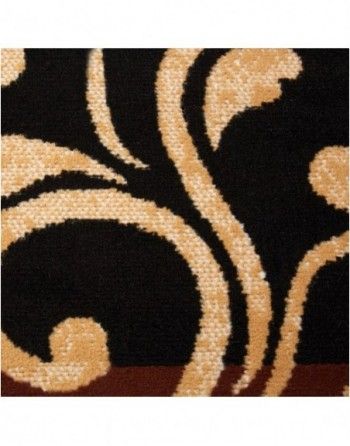 A black and tan rug with a swirl pattern