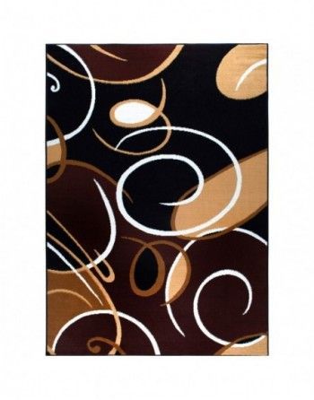 A brown and black rug with white swirls on it