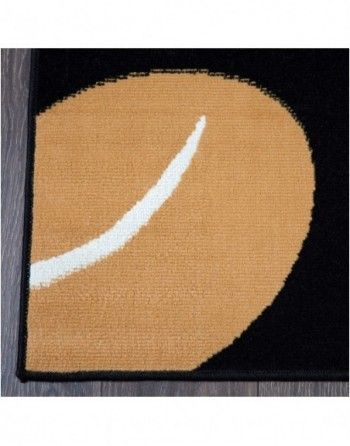 A black and tan rug with a white line on it.