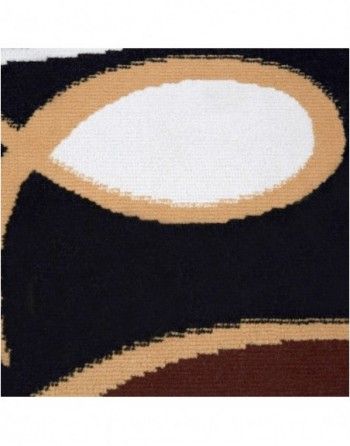 A black and brown rug with a white circle in the middle