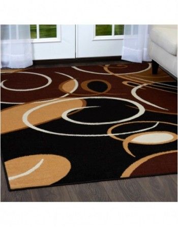 A brown and black rug in a living room
