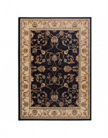 A black rug with a floral pattern on it