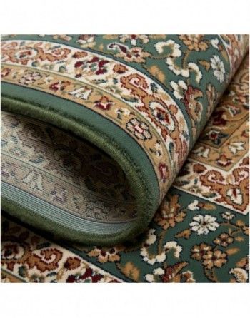 A close up of a rug with a floral pattern on it.