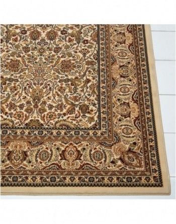 A rug with a floral pattern is sitting on a white table.