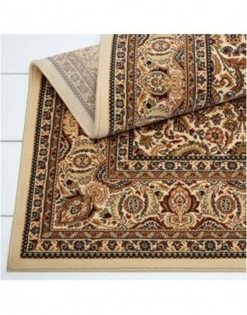 A rug with a floral pattern is laying on a table