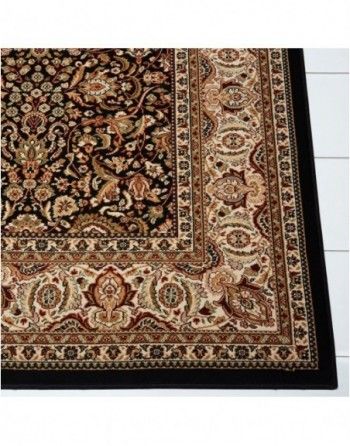 A close up of a rug with a black border