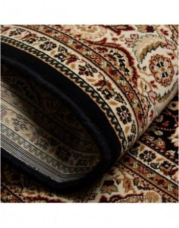 A close up of a rug with a black border