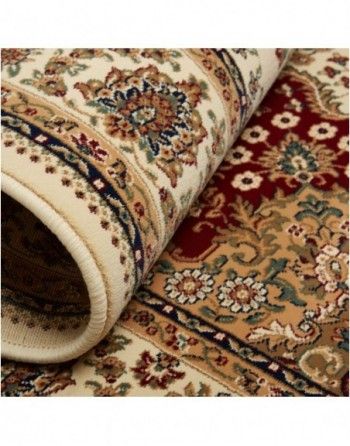 A close up of a rug with a floral pattern on it