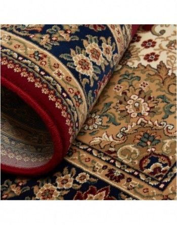 A close up of a rug with a floral pattern on it