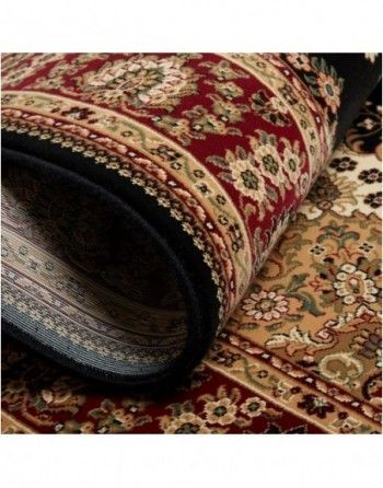 A close up of a rug with a floral pattern