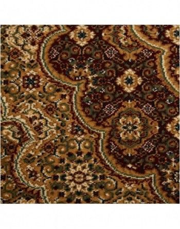 A close up of a rug with a floral pattern on it.