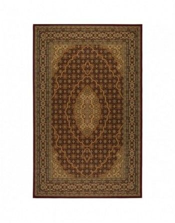 A brown and gold rug with a floral pattern on a white background.