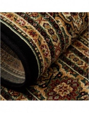 A close up of a rug with a floral pattern on it