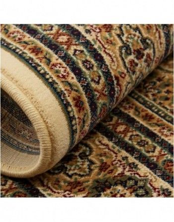 A close up of a rug with a pattern on it.